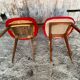 Paire de chaises Achille Decommere en fausse fourrure rouge et pieds compas en bois