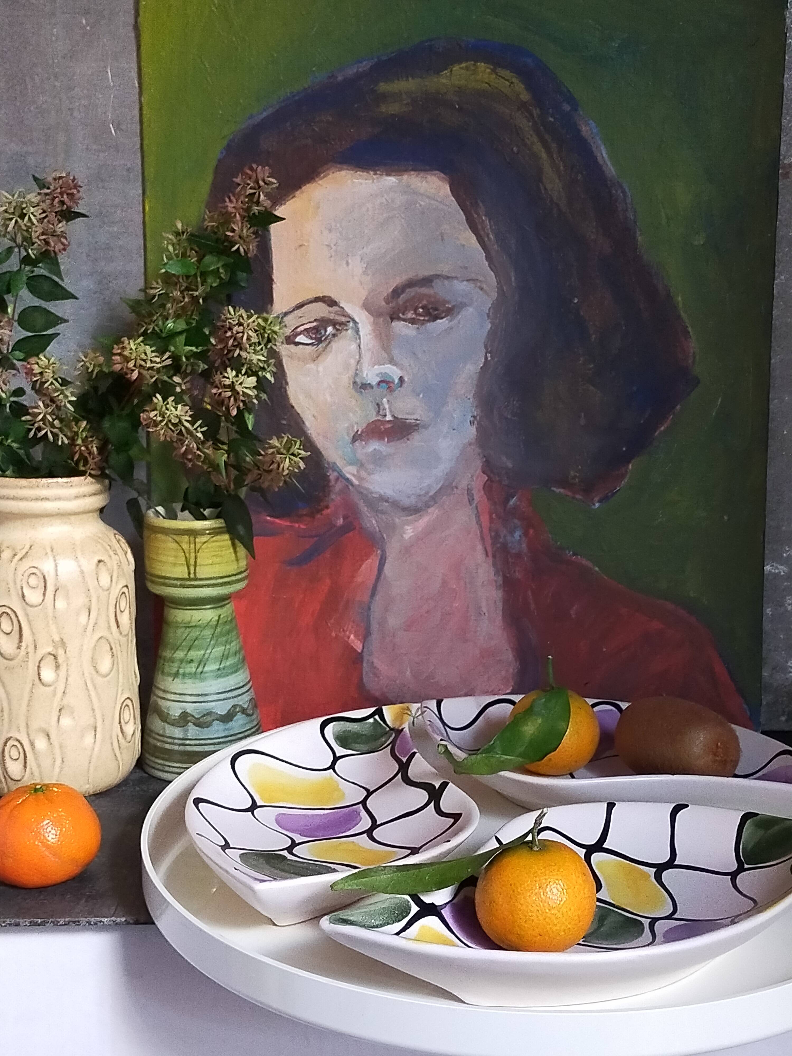 Three vintage free-form ceramic ravine dishes from the 1950s