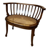 Caned armchair