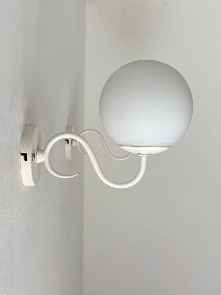 Pair of vintage metal and opaline wall lights, France, 1980.