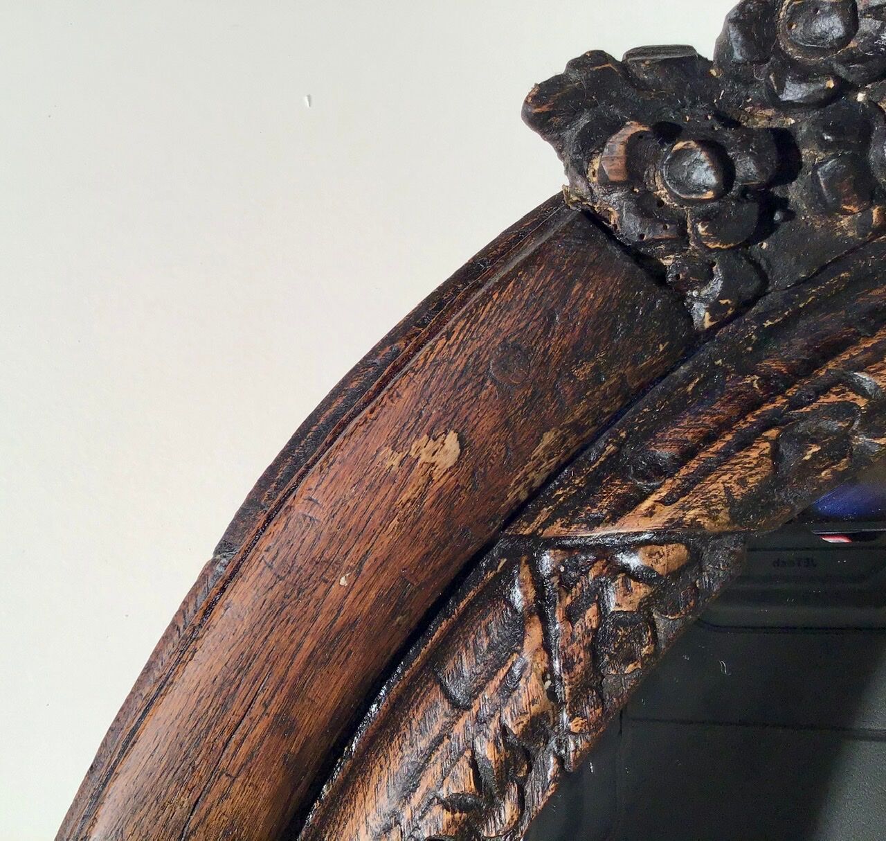 Oval mirror on an 18th century frame