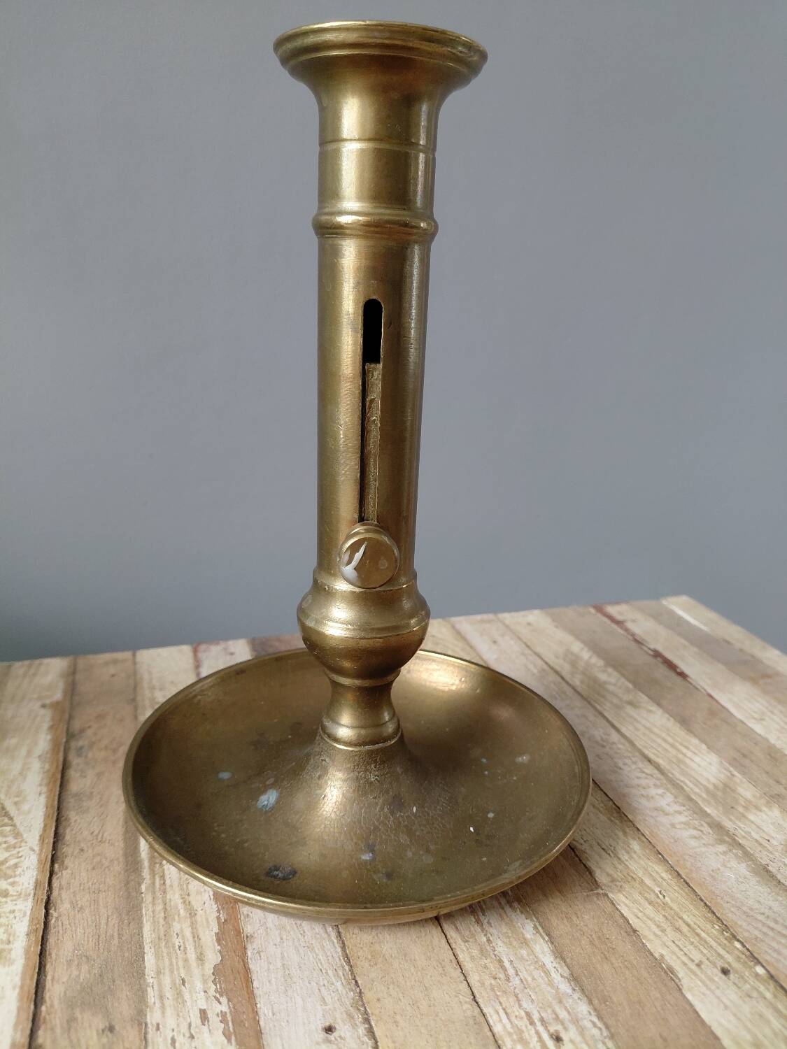 Push candle holder in brass