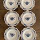 Dessert plates in Rouen faience with hand decoration.