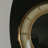 Famous black vintage mechanical wall clock