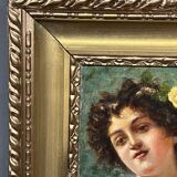 Portrait of a young woman. Signed Nevelli.