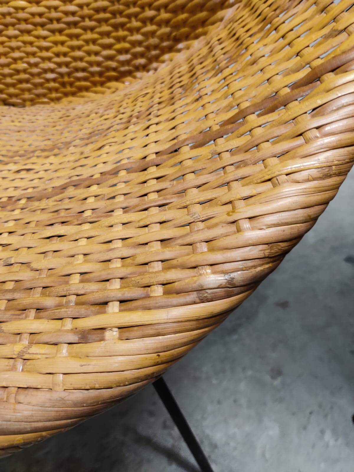 Pair of braided rattan armchairs