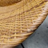 Pair of braided rattan armchairs