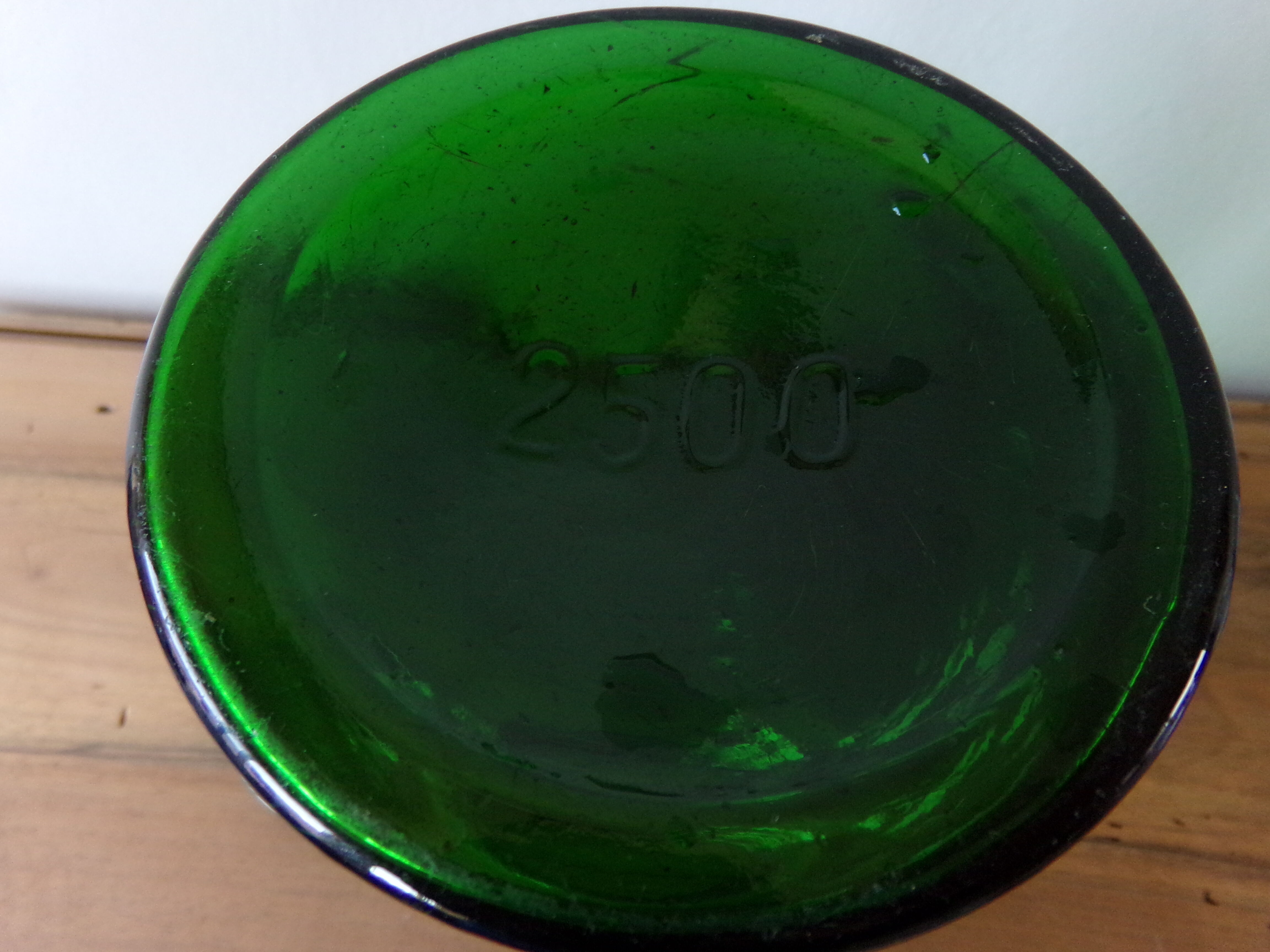 Antique green glass jar