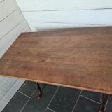 Bistro table with cast iron base and oak top