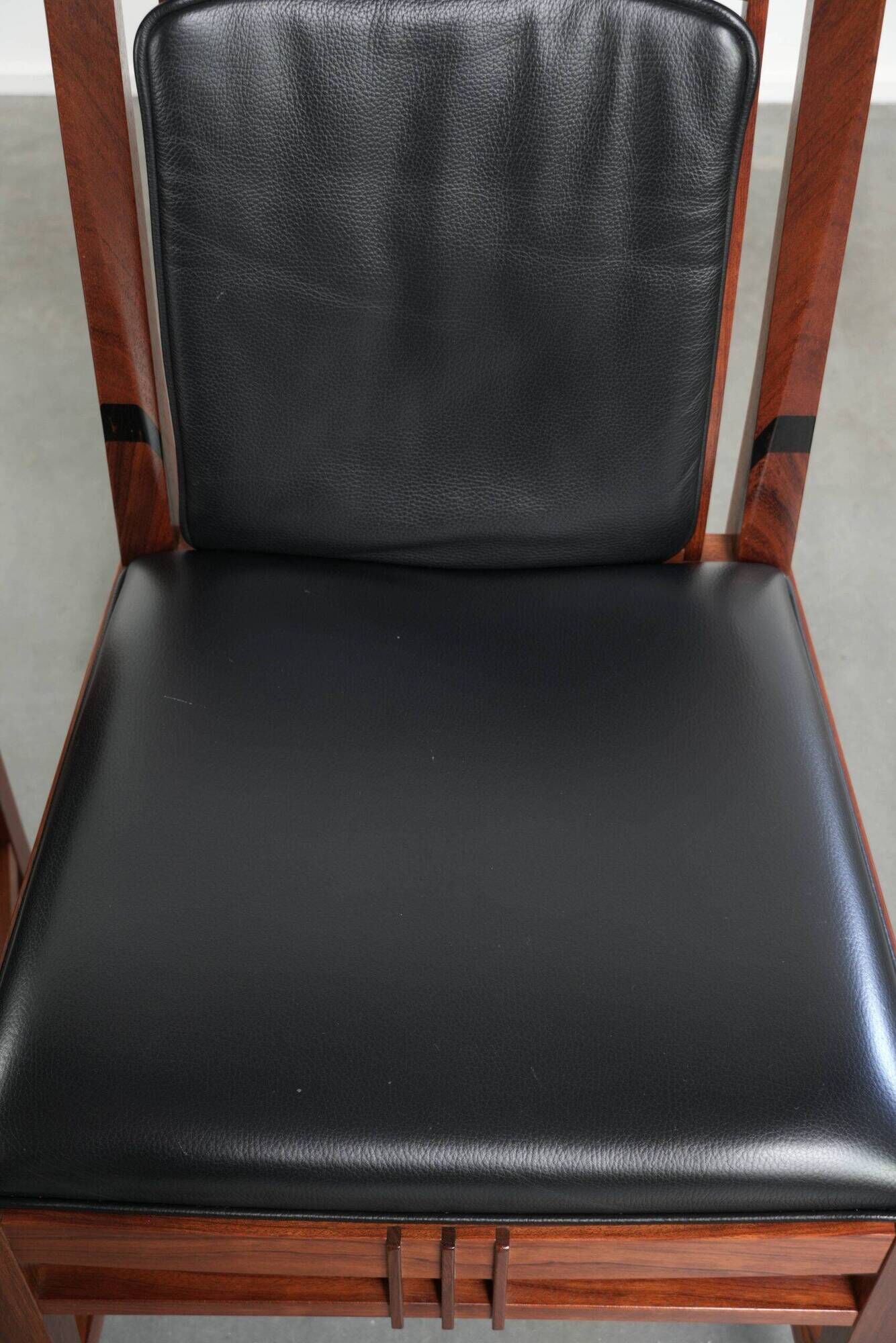 Elegant set of four black cowhide and wooden Art Deco dining chairs