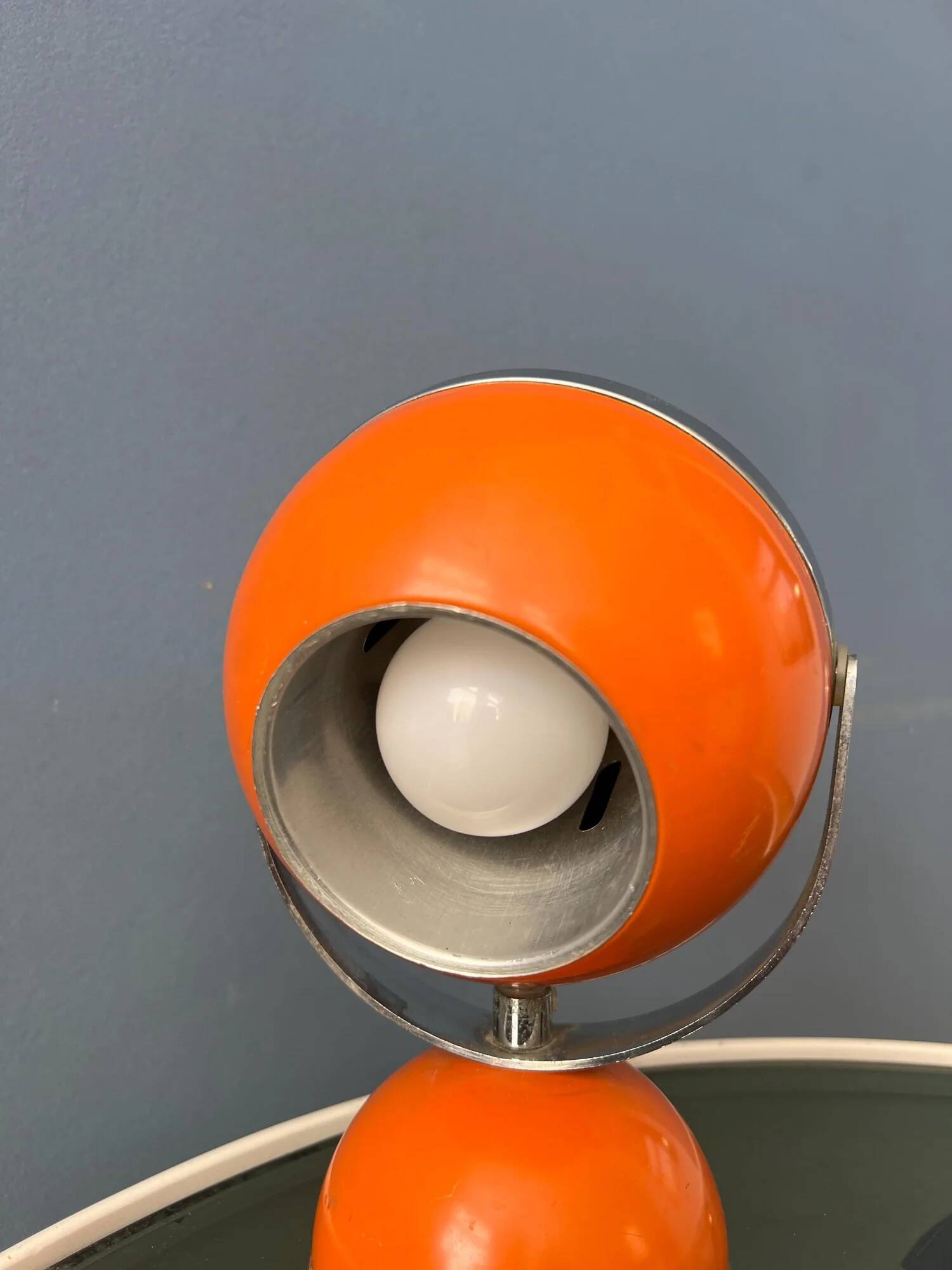 Orange mid-century space age eyeball table lamp