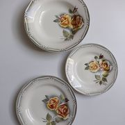 3 Digoin Sarreguemines Adèle plates in grey, yellow, and burgundy.