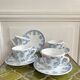 5 coffee cups with blue flower decor from the 70s