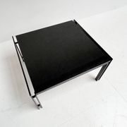 Black granite side table or coffee table from the 1980’s