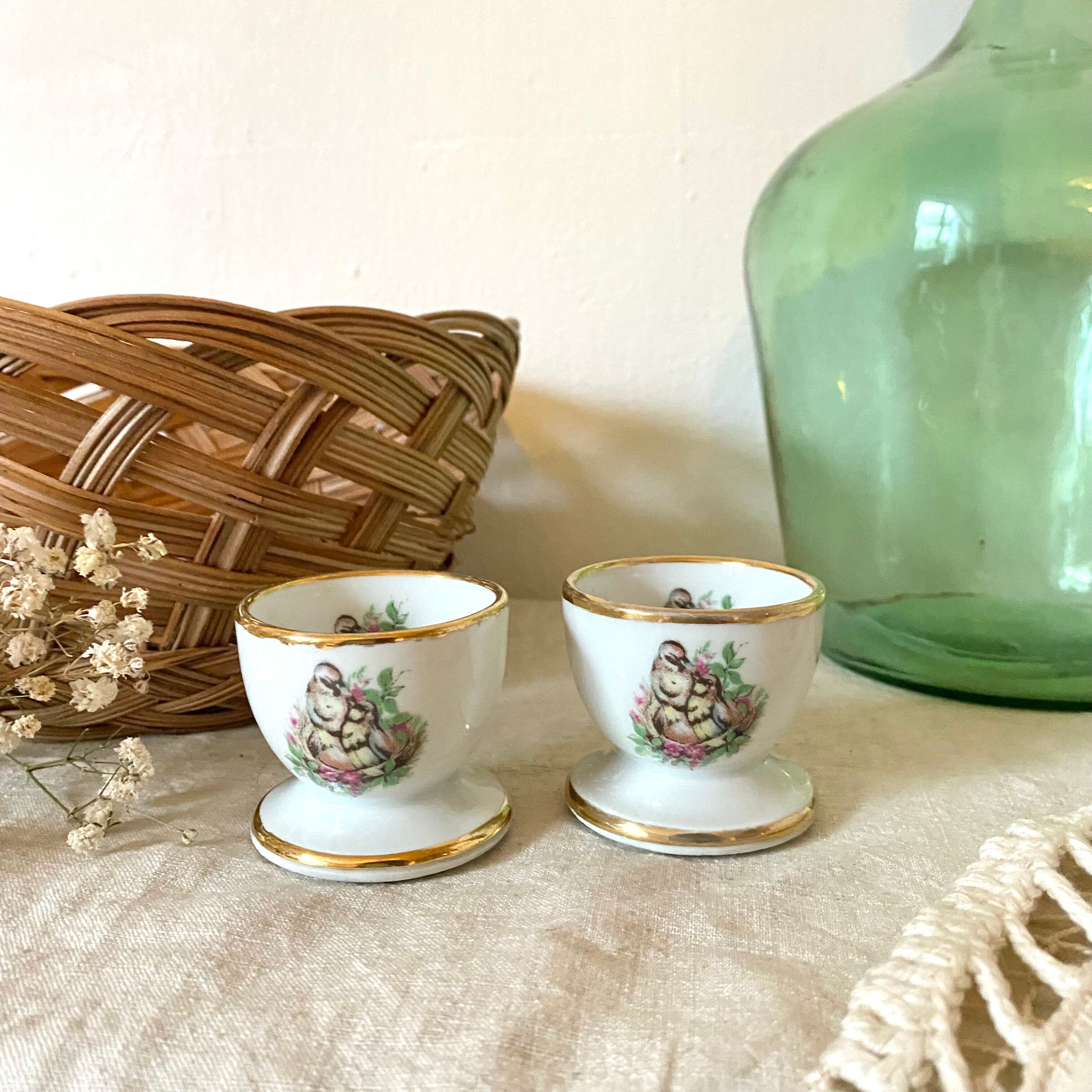 2 porcelain shells birds