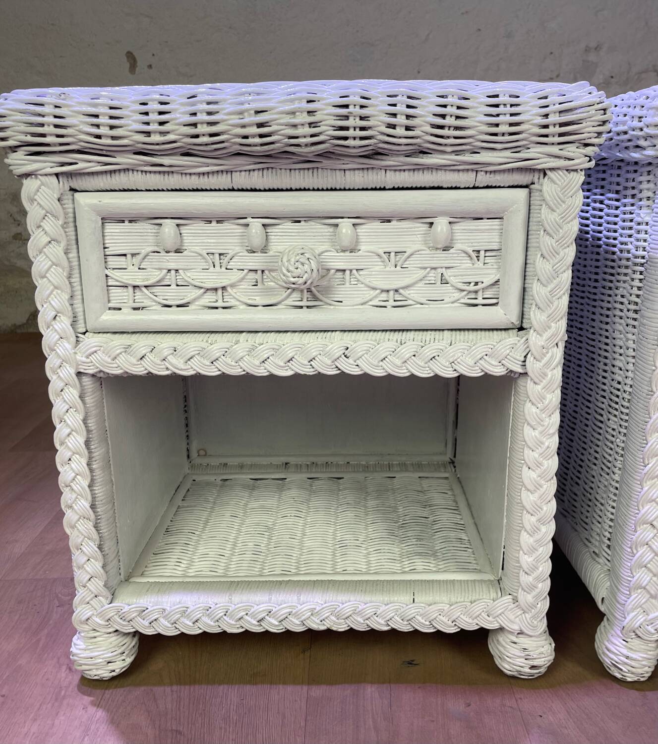 Pair of white lacquered rattan bedside tables