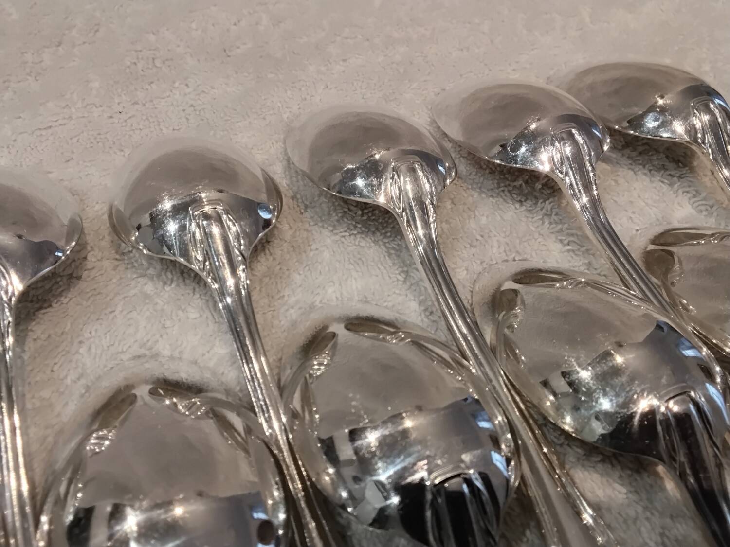 12 silver plated dessert spoons, Argental art deco goldsmith