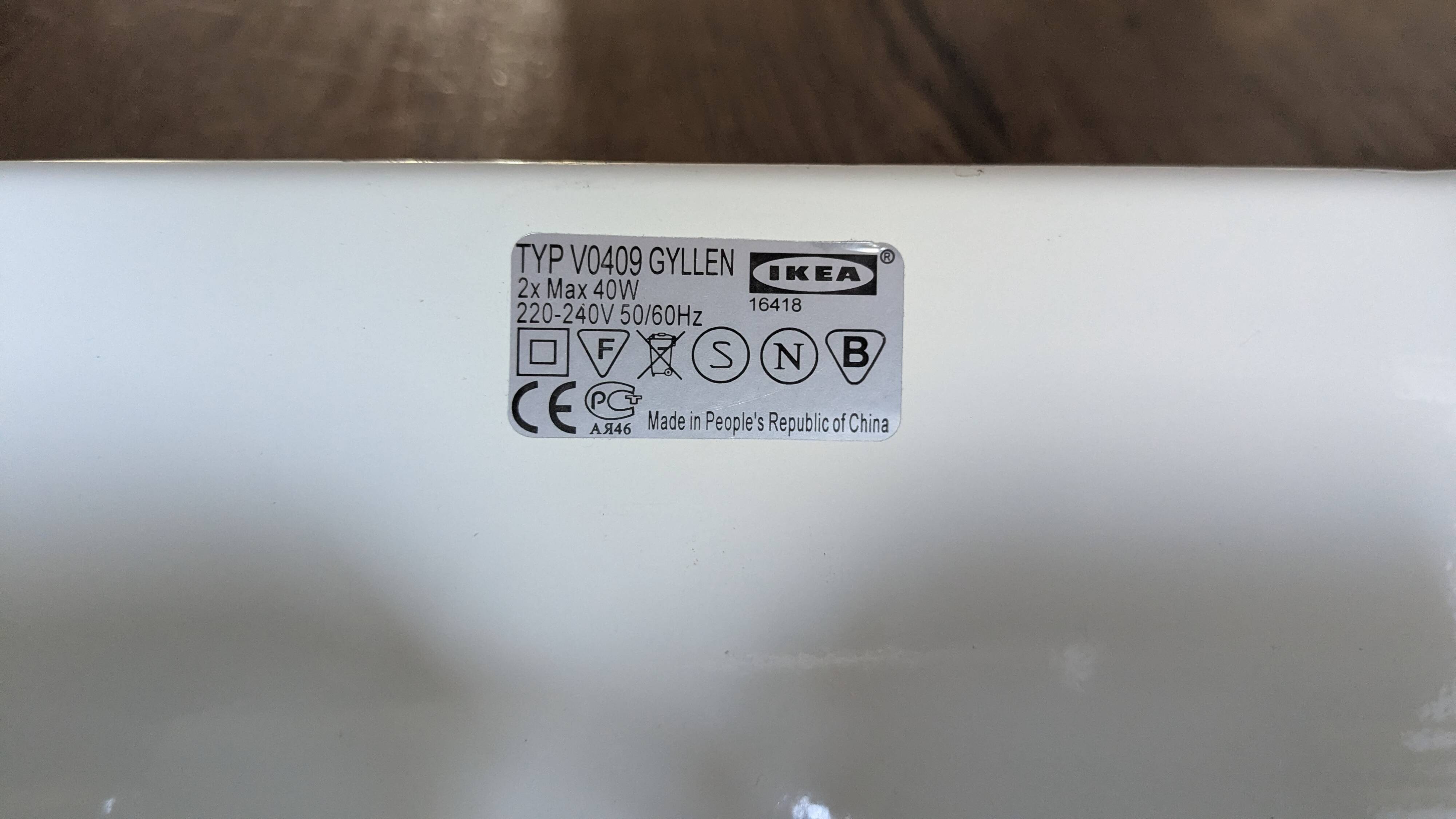 IKEA Gyllen wall lamp in decorated glass, Scandinavian design.