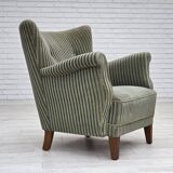 Fauteuil danois des années 1960, revêtement en velours vert, pieds en chêne.