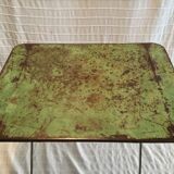 Folding riveted iron table