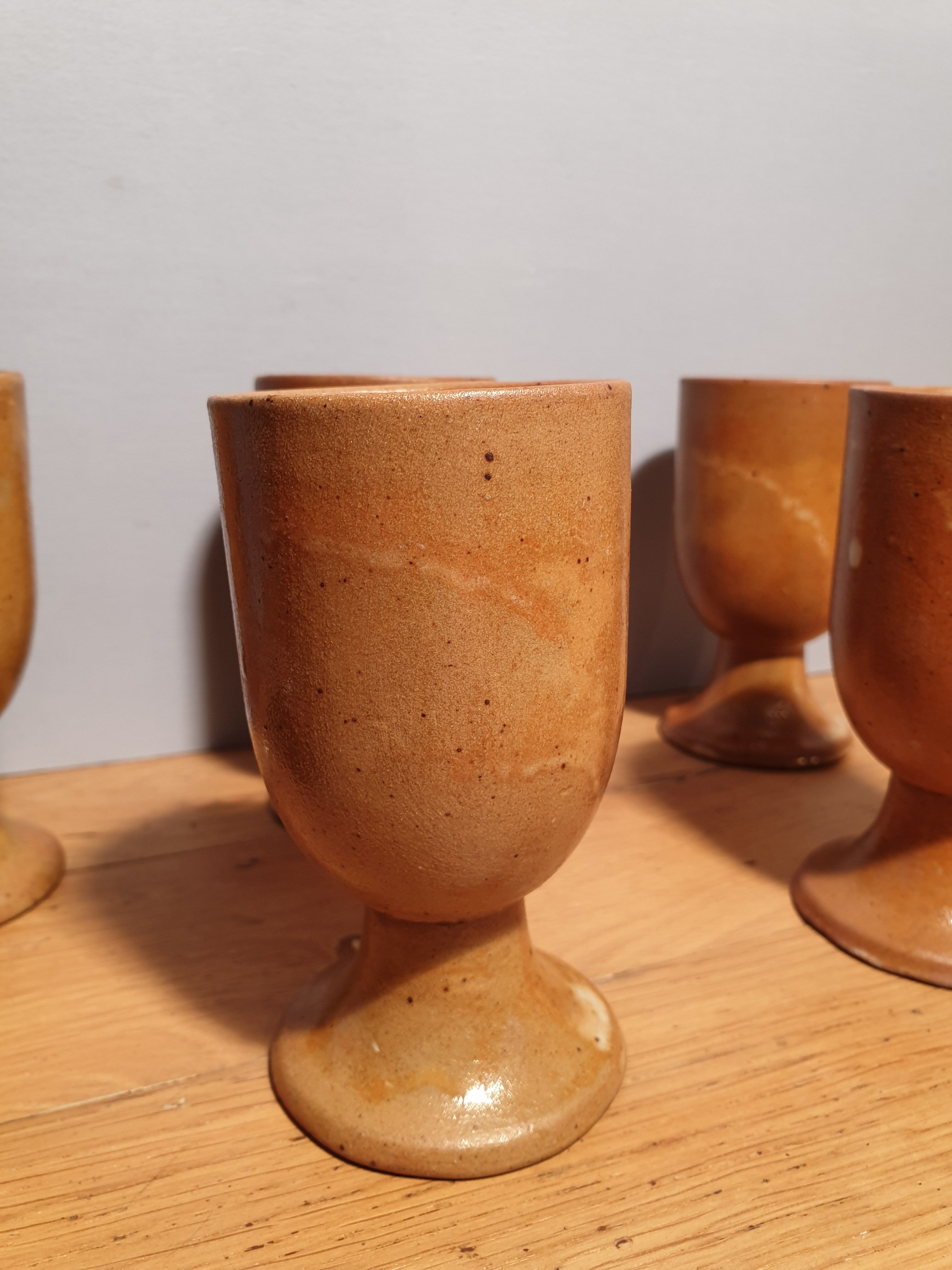 Set of 6 sandstone foot glasses