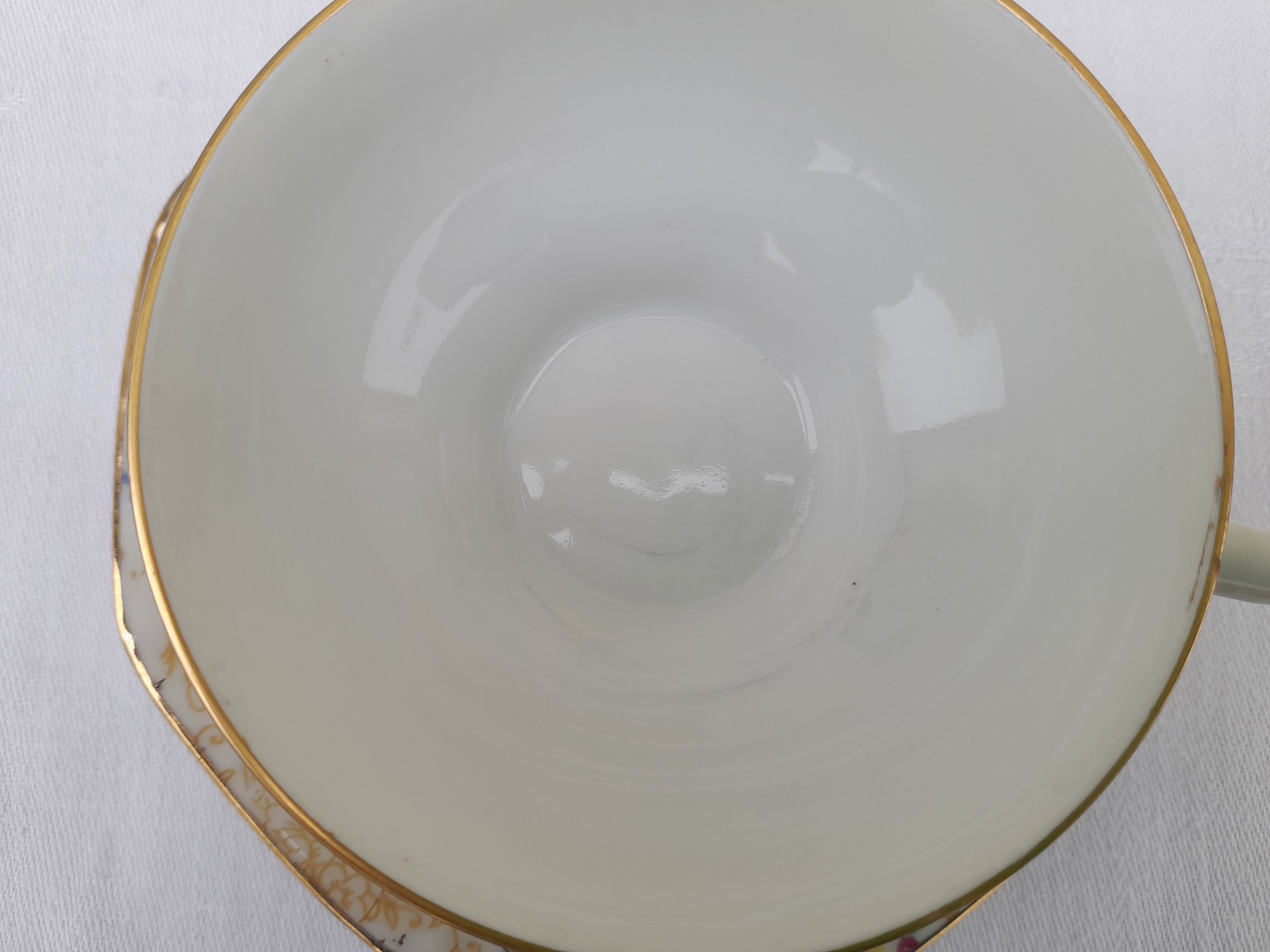 Lourioux Foecy porcelain tea set 12 cups, a sugar bowl and a crèmier