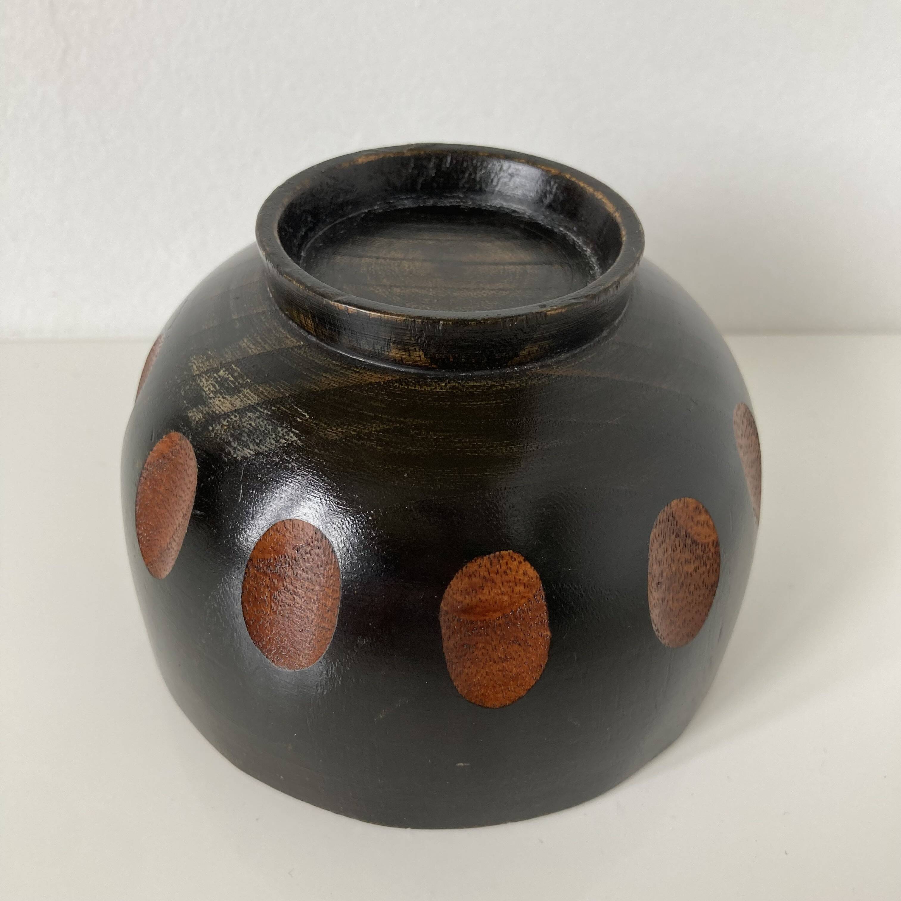 Japanese Showa bowl made of stained brown paulownia wood and carved.