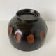 Japanese Showa bowl made of stained brown paulownia wood and carved.