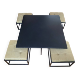 Mat black metal coffee table and 4 stackable stools.