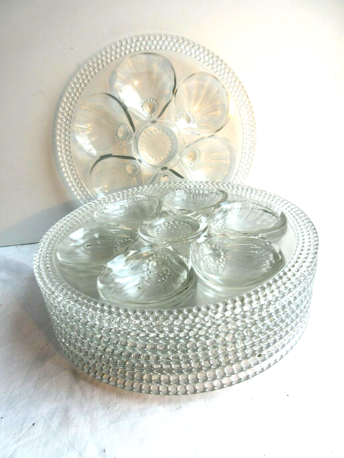 Set of 9 oyster plates in thick glass quite heavy, vintage or Art Deco