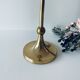 Golden brass candle door