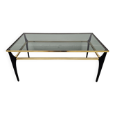 Mid Century Modern coffee table with gold-plated metal and smoked glass.