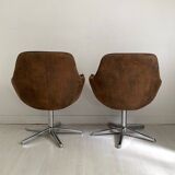 Pair of brown suede swivel office chairs