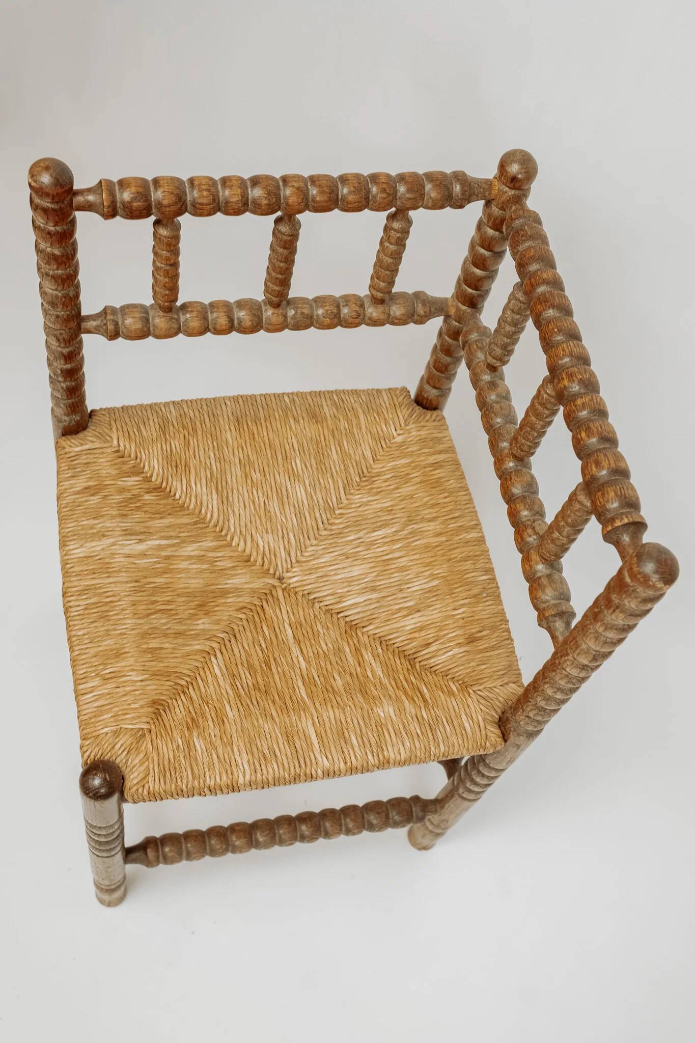Classic vintage bobbin corner armchair