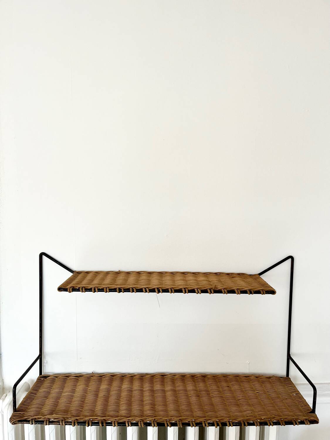 Raoul Guys rattan wall shelf 1950