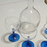 Old carafe and its wine glasses