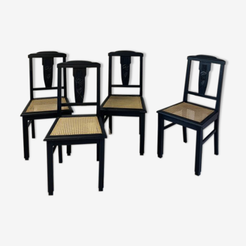 Chaises noir et cannage