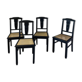 Black chairs and cannage