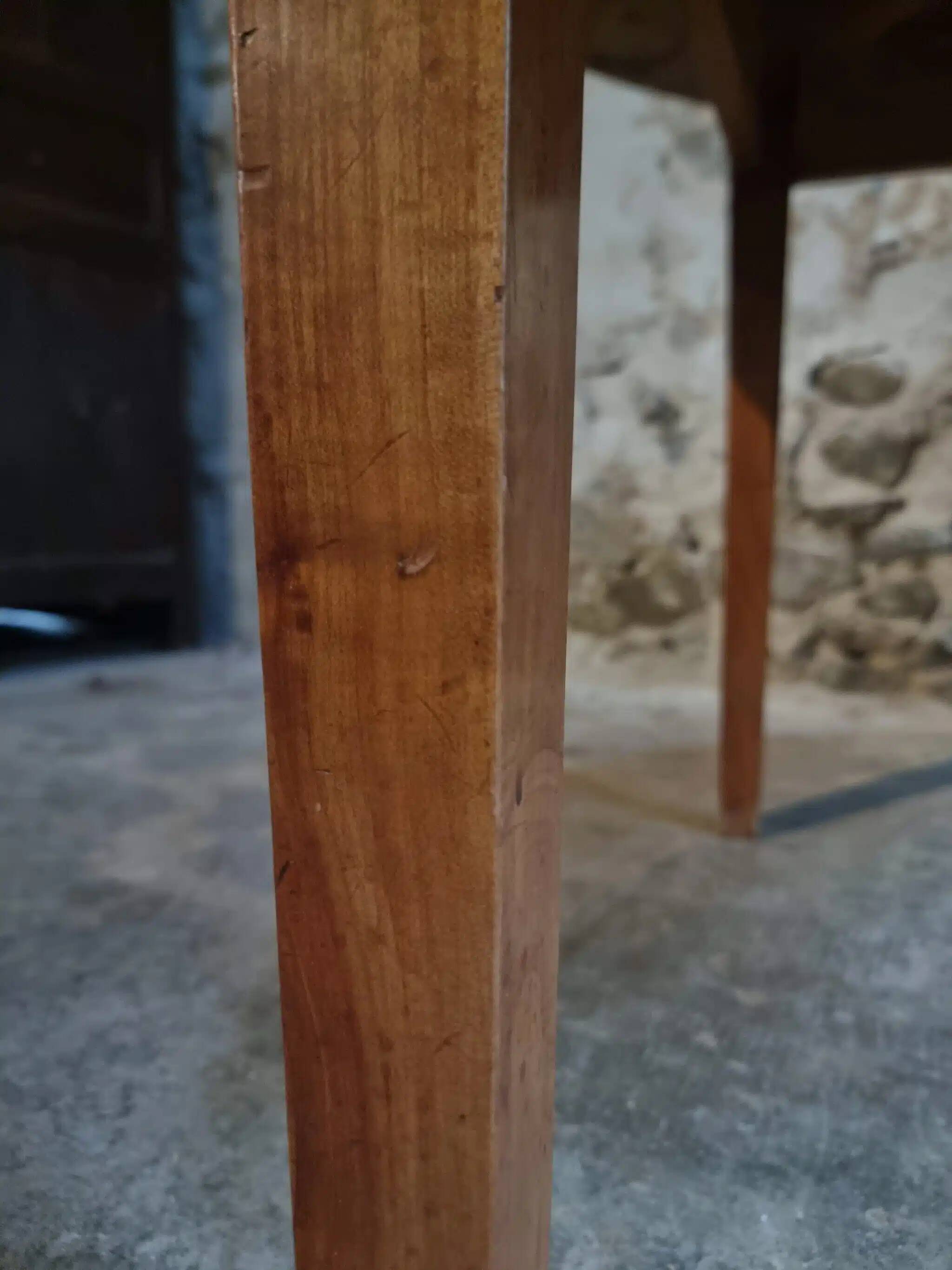 Antique round dining table in cherry wood, France, circa 1920.