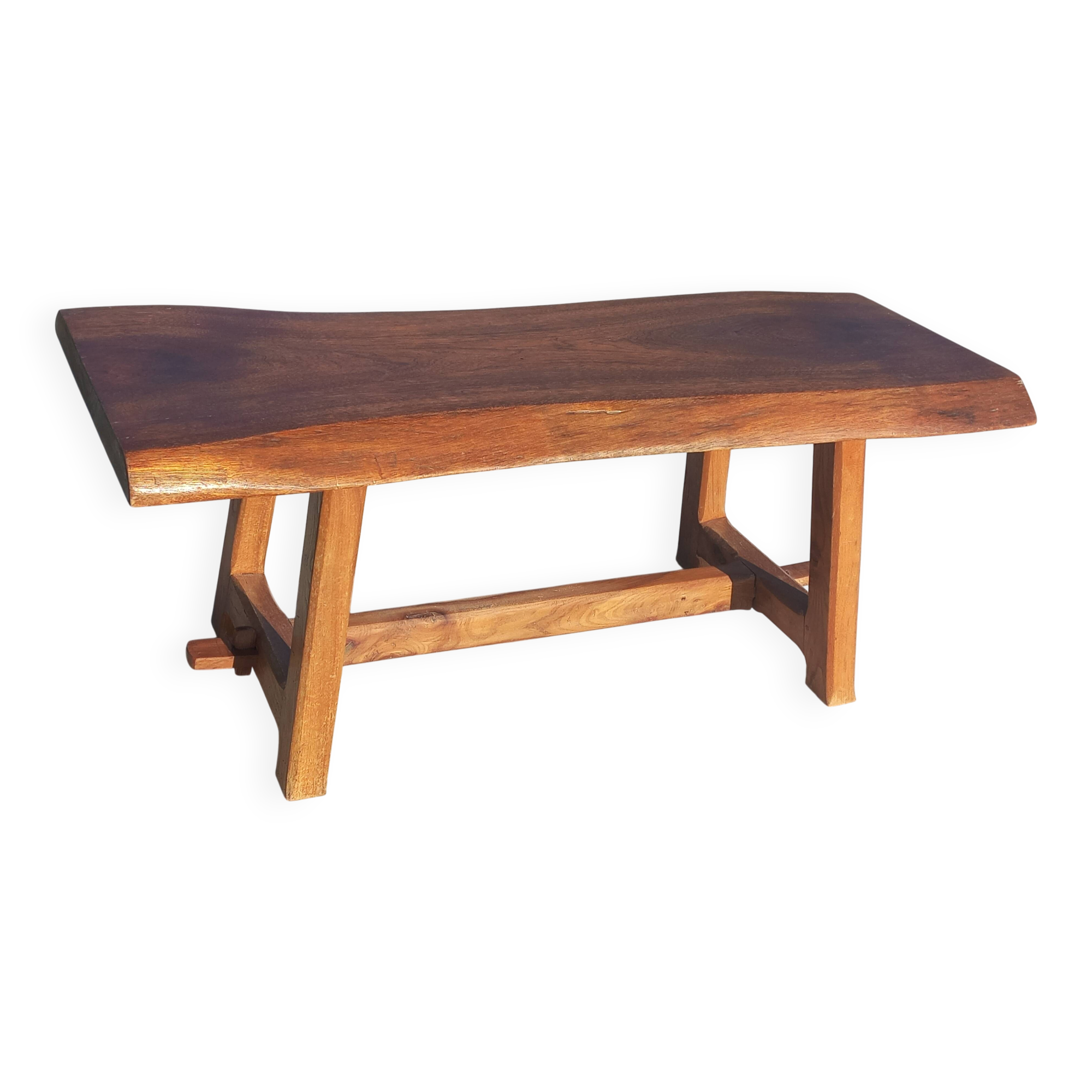 Rustic handcrafted coffee table with a mahogany top and elm legs.