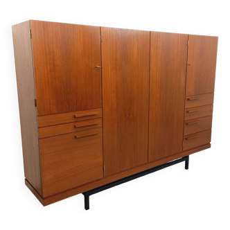 High Scandinavian modernist vintage sideboard in teak and black metal.