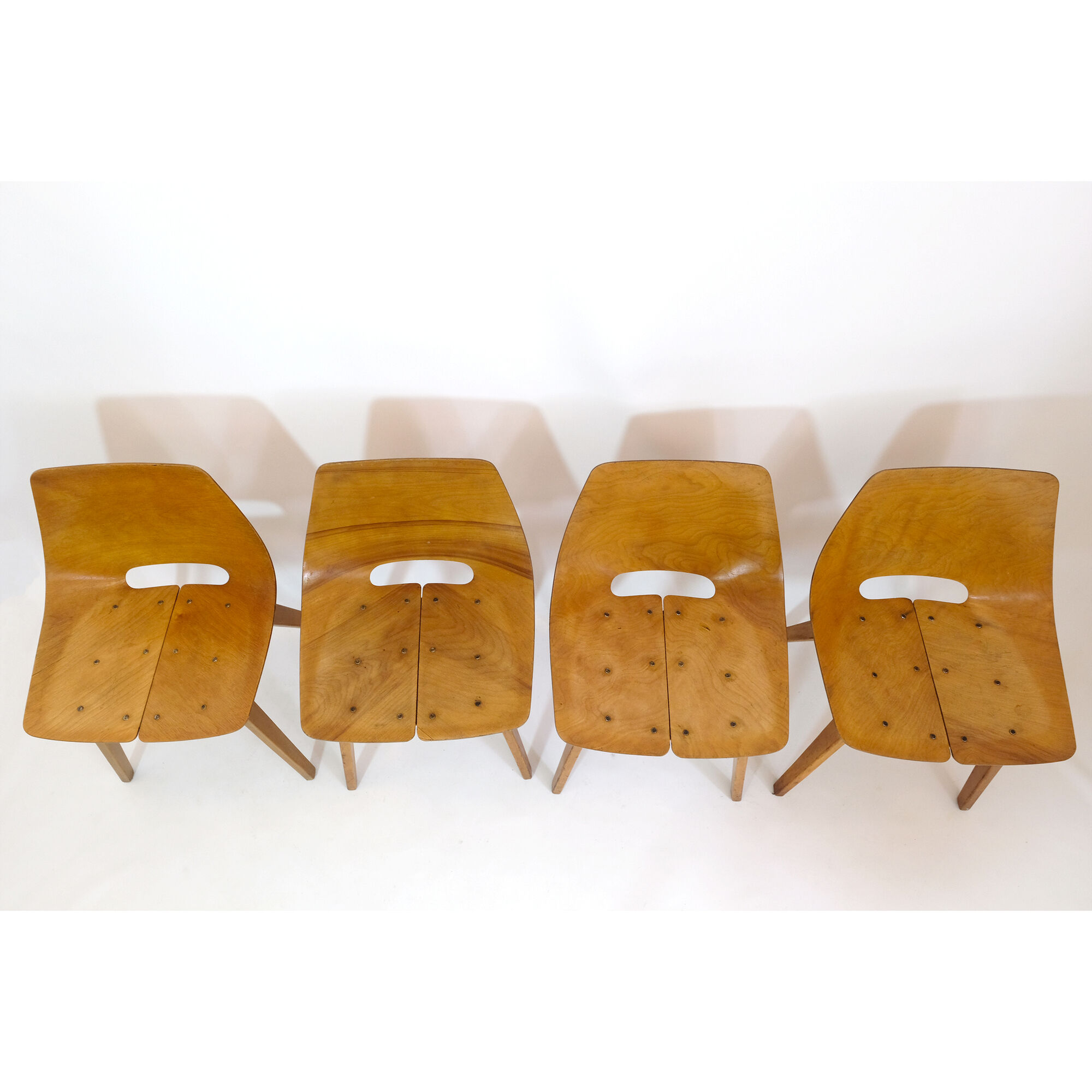 Set of 4 barrel chairs, wooden base, Pierre Guariche, Steiner, 1950s.