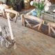 Bistro chairs with cross-back, cane seat.