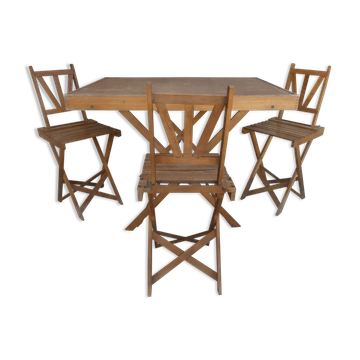 Table and its 3 folding wooden chairs for children, 1950s.