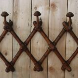 Turned wood wall coat rack