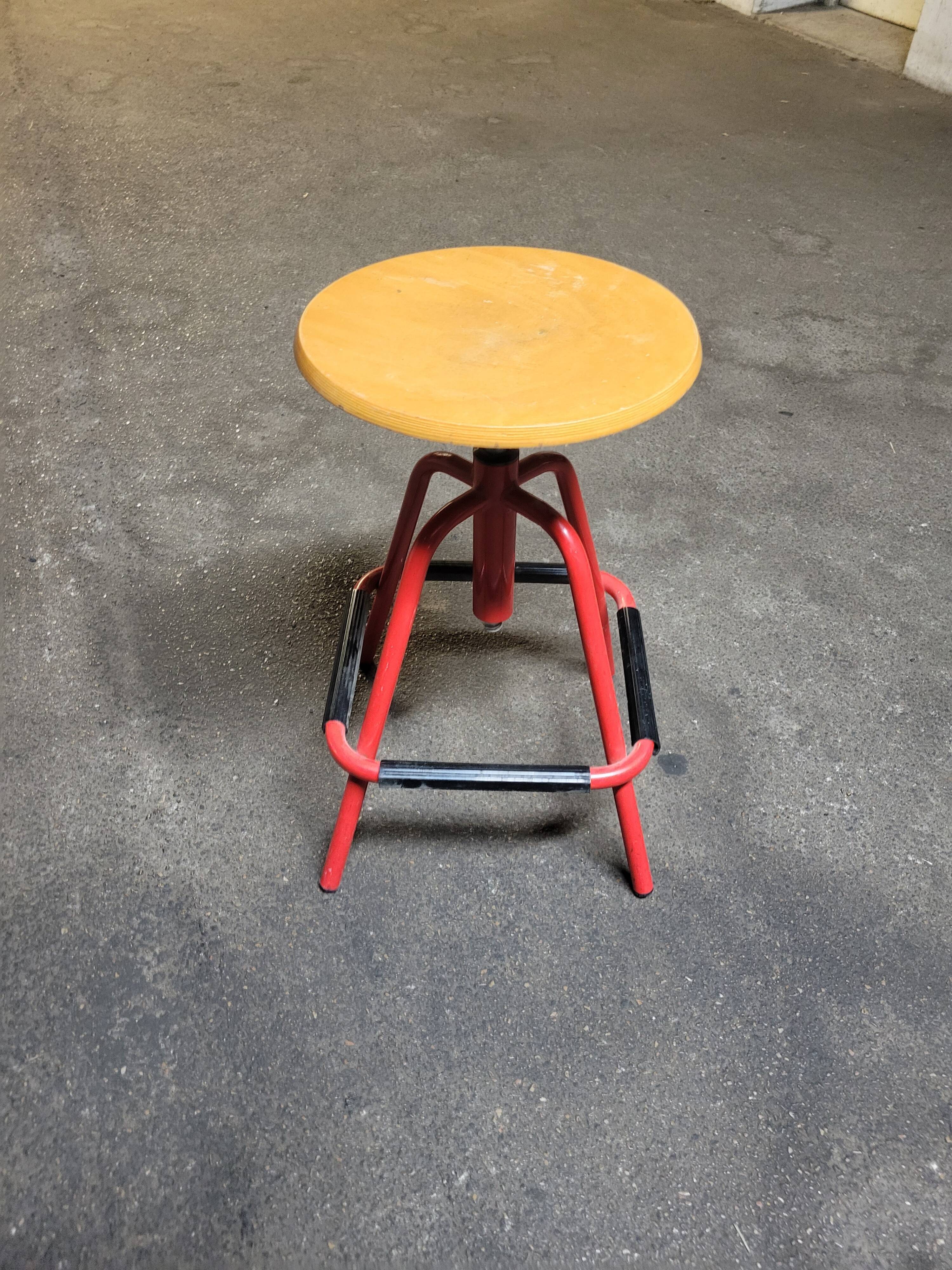 Red stool with industrial vintage screw 80s