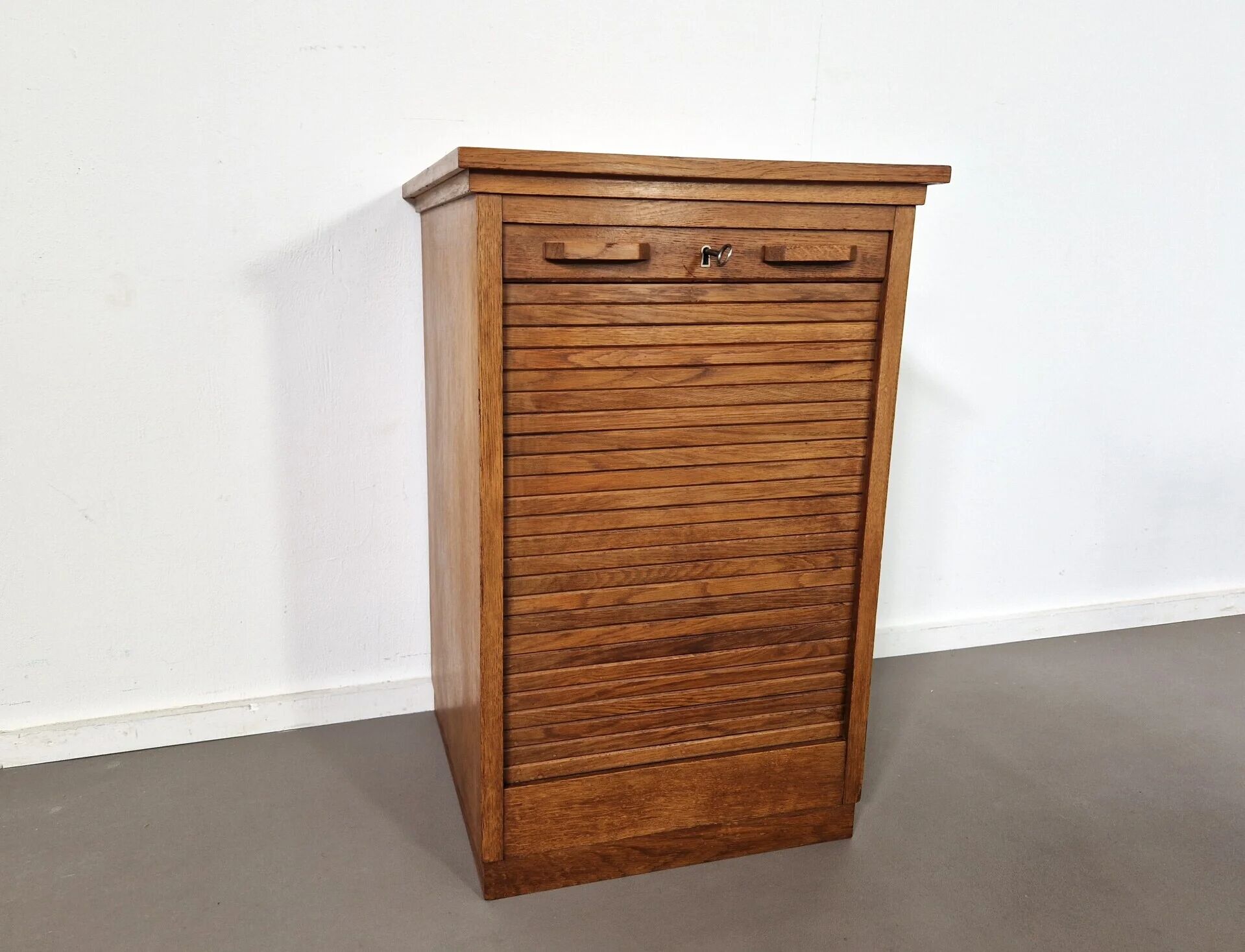 Vintage oak tambour cabinet | 1940s