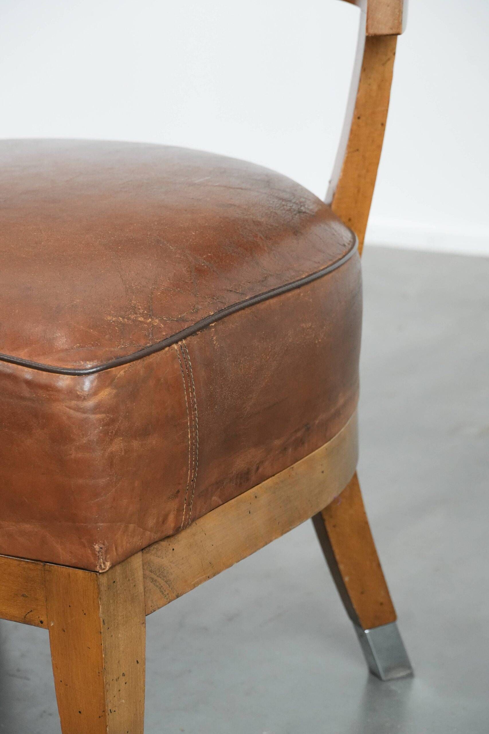 Set of 4 vintage design chairs made of sheepskin leather