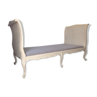 Carved wooden bench and caning bed