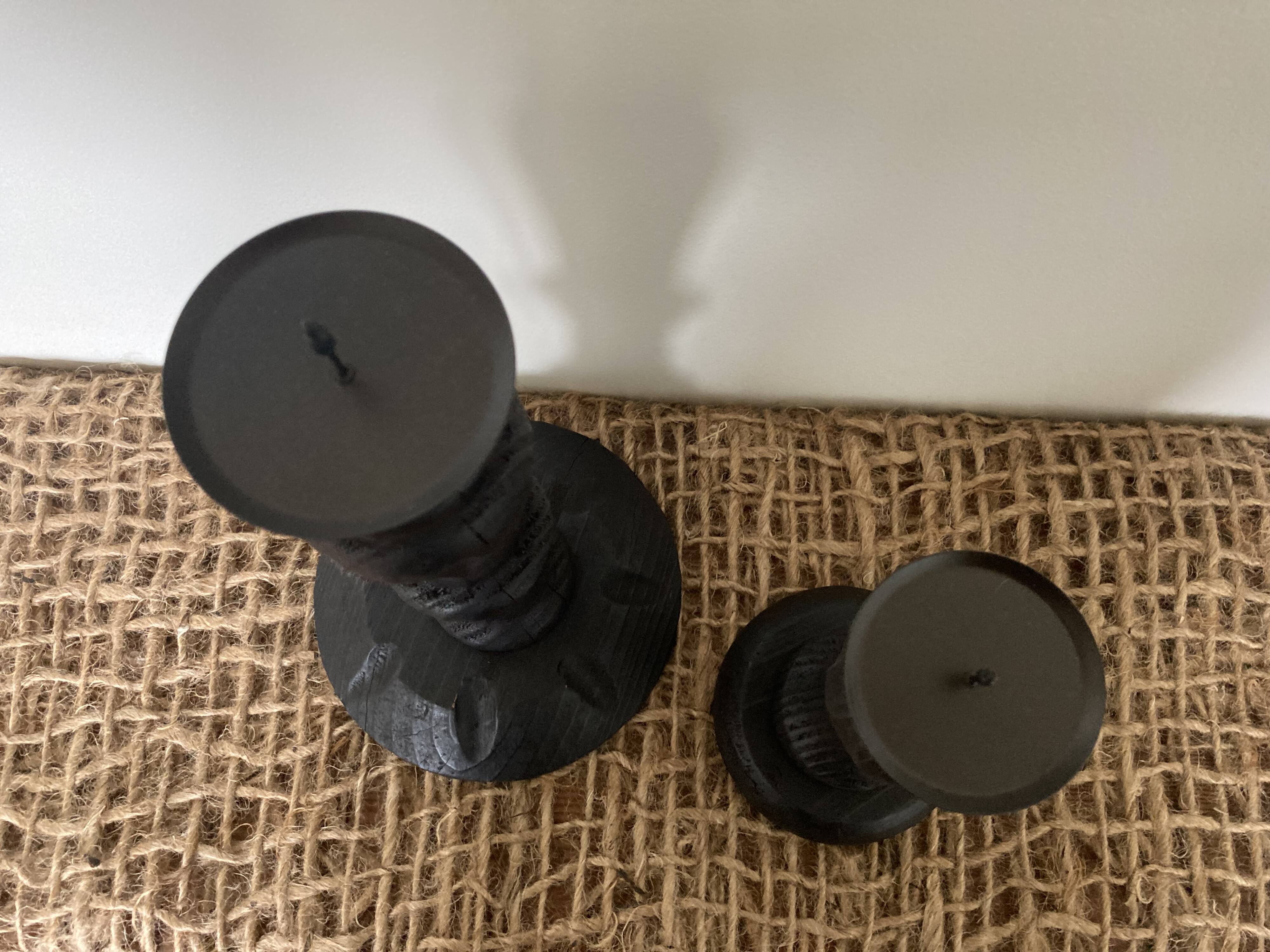 Black wooden candlesticks